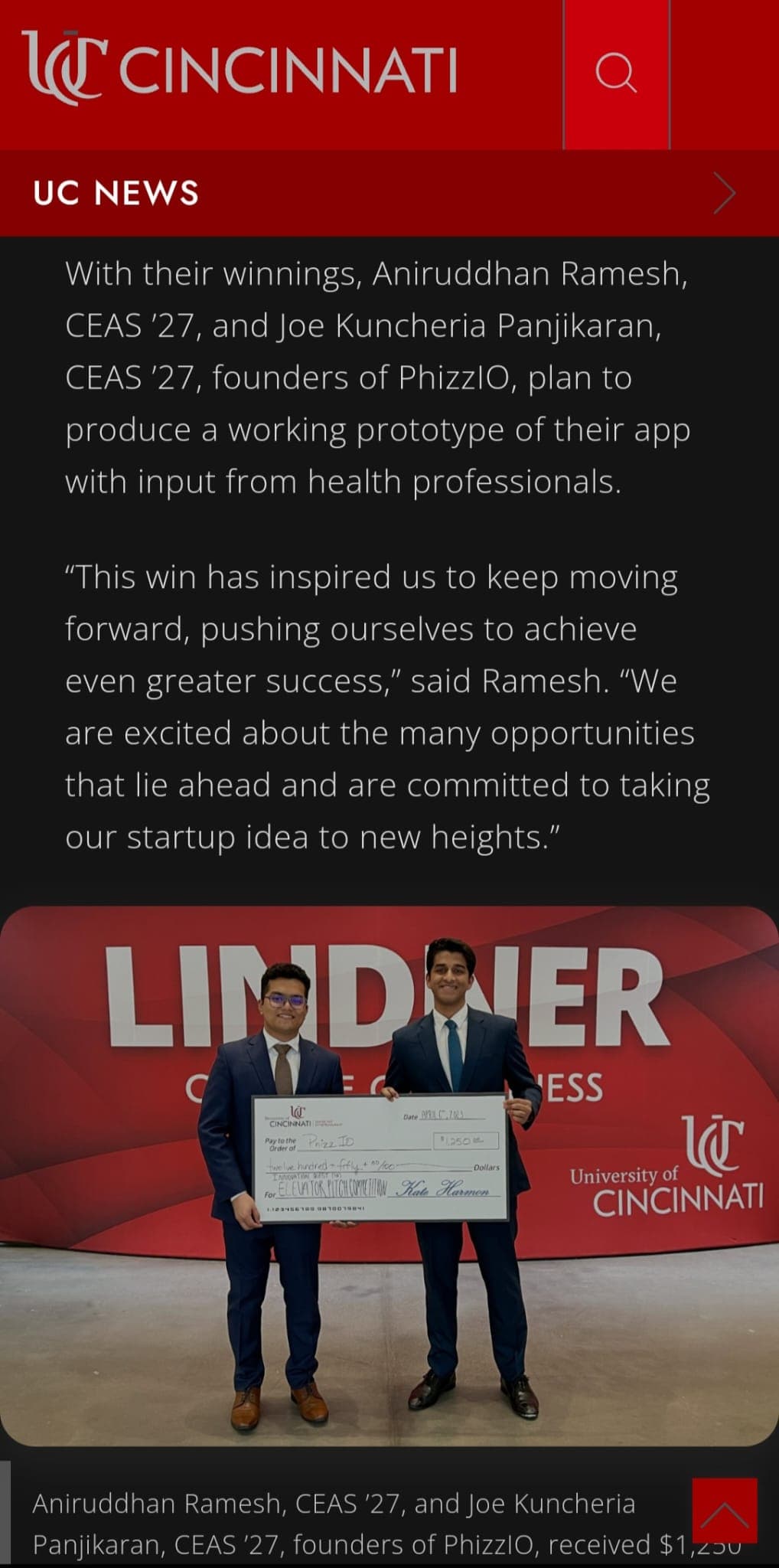 UC News article showing Aniruddhan Ramesh and co-founder Joe Kuncheria Panjikaran holding a $1,250 prize check after winning an elevator pitch competition at the Lindner College of Business